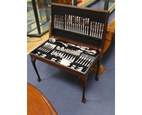 A leather inset canteen of silver plated flatware