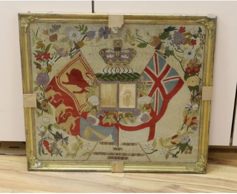 A late 19th century woolwork commemorative panel of two soldiers, W.H and R.R. James incorporating their photographs, 50 x 57