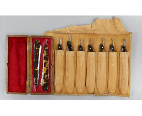A set of seven tortoiseshell handled cut throat razors for the days of the week Wilkinson and a cased pair of tortoiseshell h