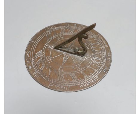 A cast brass sundial 19.5cm diameter