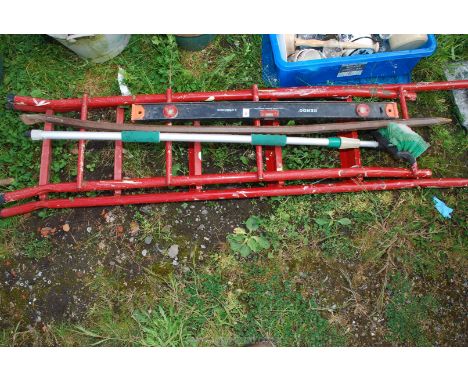 A metal step ladder, crow bar, car brush and level.