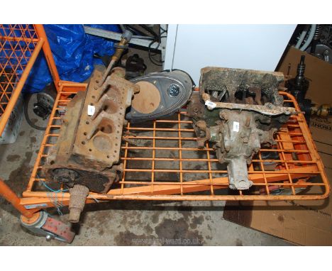 A Mini engine block and gearbox, dash with central consul, sold as seen.