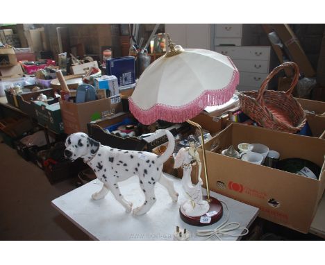 A china lady lamp (Worked at time of testing) and a resin Dalmatian dog.