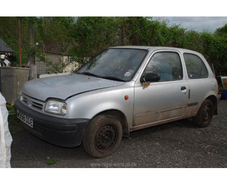 A Silver Nissan Micra, silver, petrol, 998 cc., registration number M998 DDE, first registered 24th April 1995. Last MOT (wit