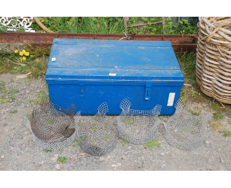 A metal trunk, 31'' x 18'' and wire baskets.