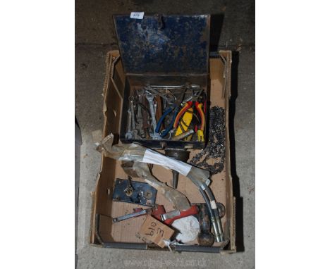 Tow ball, chainsaw chain, three new flexible brake pipes, metal toolbox and spanners.