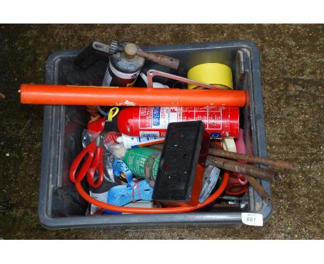 A fire extinguisher, long stone, masonry drill, internal pipe benders and blow lamp.