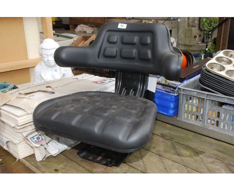 A wraparound tractor seat