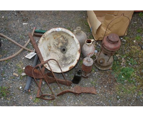 A head stirrup pump, cast iron circular bowl, miner's lamp, etc.