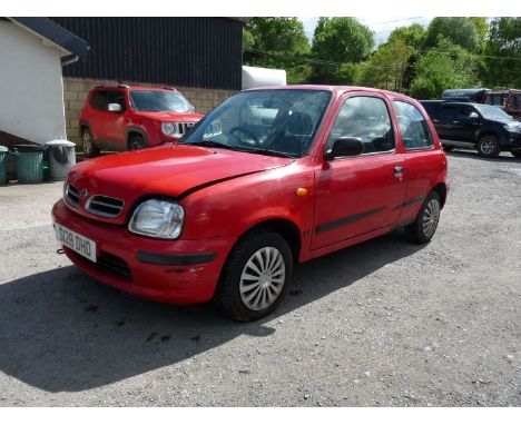 A Red Nissan Micra 16v. petrol, 998 cc., registration number S128 DHO, first registered 30th October 1998.  Mileage at last M