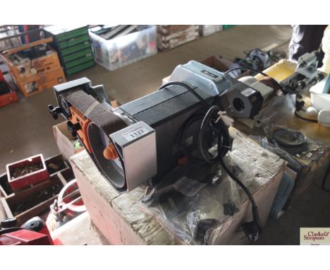 An Elu sander and grinder with some tools and accessories