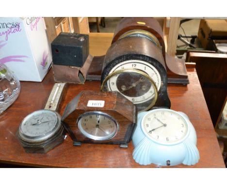 An Art Deco wall clock; a barometer; boxed camera and three mantel clocks