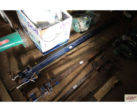 A pair of five foot sash clamps