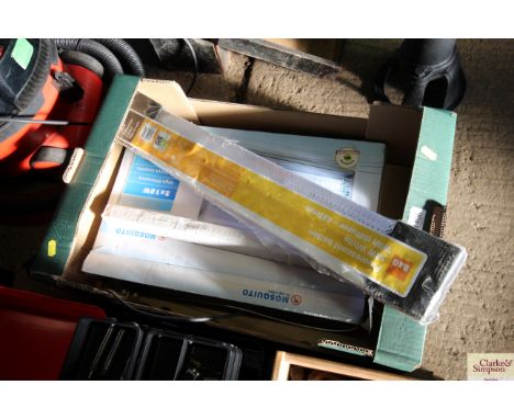 A Mosquito electric zapper; a B &amp; Q fluorescent baton 18 watts light and a singular fluorescent light bulb