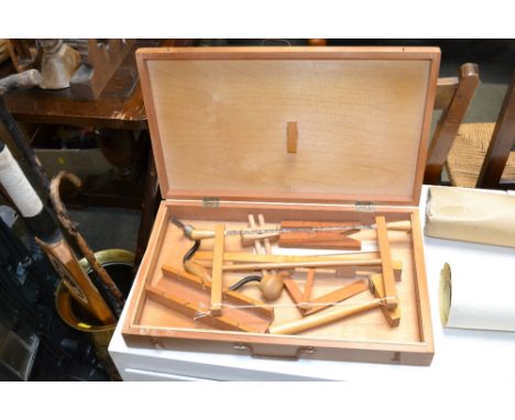 A small wooden tool box and contents of woodworking tools 