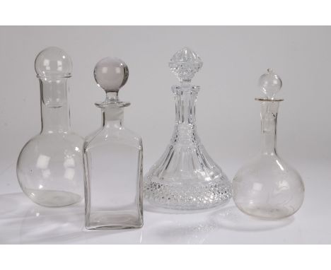 Glass decanters, to include an example decorated with a fern leaf, a ships decanter a contemporary example and another, (4)