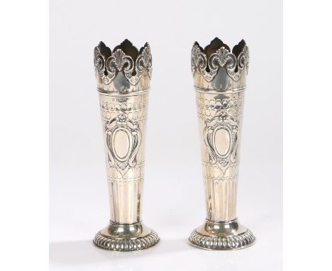 Pair of Edward VII silver spill vases, Sheffield 1901, maker William Hutton &amp; Sons Ltd, with shell and scroll cast rims a