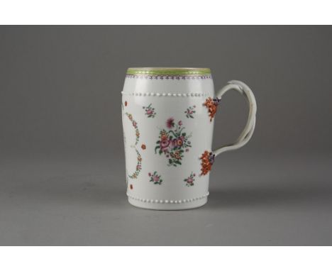 Famille rose mug with ribboned handle and Monogrammed JMK on front.  A rare form with finely brushed and fired enamel decorat