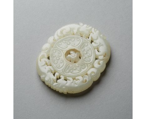 The wheel well carved in thick pale jade. Excellent quality of carving. Center star moves so the wheel can rotate in a circul