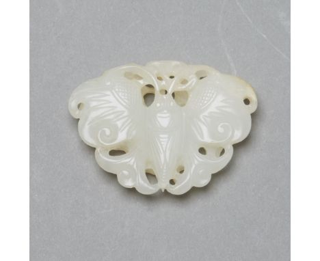 A wonderful and rare example of a Jade pendant, depicting a well rendered butterfly on one side, and a bat and Buddha's hand 