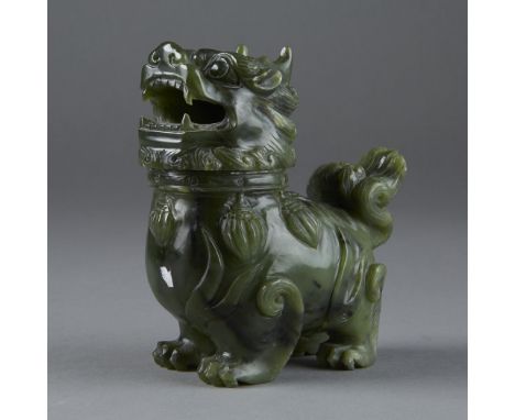 A well carved chinese jade censer in the form of a shi shi or foo dogDimensions: 4 in. x 3.5 in., Weight: 455.7gCondition:Goo