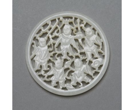 Fine example of a circular, white jade medallion of boys playing. Very fine quality of jade. Excellent Piercing work. Dimensi