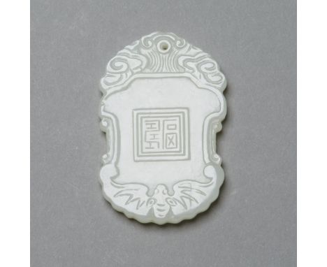 A very fine Chinese pendant carved in a thick and very pale chinese jade. Excellent quality in every detail. Dimensions: 2 7/
