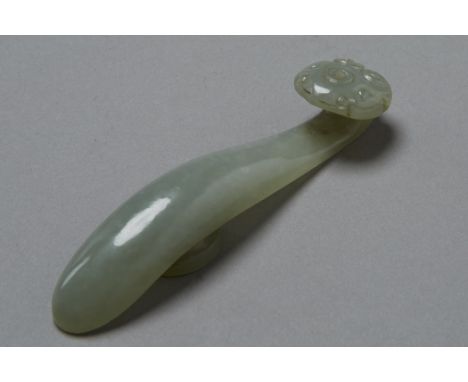 Nice example of Chinese belt hook carved with lingbi on the head.  Lovely translucent green jade is stunning in person and di
