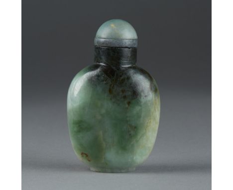 A striking Chinese snuff bottle of a lovely mottled green jade. Well hollowed. Dimensions: 2.5 in. x 1.5 in., Weight: 70.8gCo