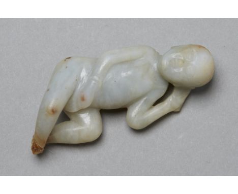 Chinese early 19th century jade, pale blue grey in tone.  Depicts a doctors model of a reclining maiden with a comb or leaves