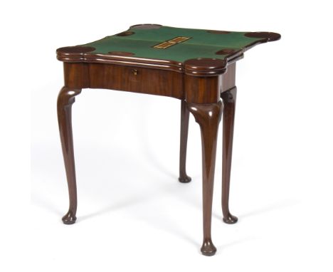 A George II style mahogany gaming table, with alterations and later inlays, the triple-fold top enclosing a baize playing sur