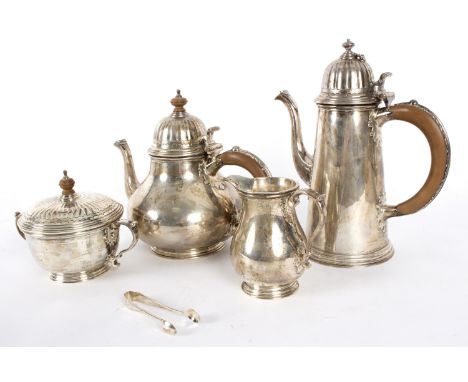 A silver four-piece tea set, William Comyns &amp; Sons Ltd., London 1964, comprising teapot, hot water pot, sugar bowl and co