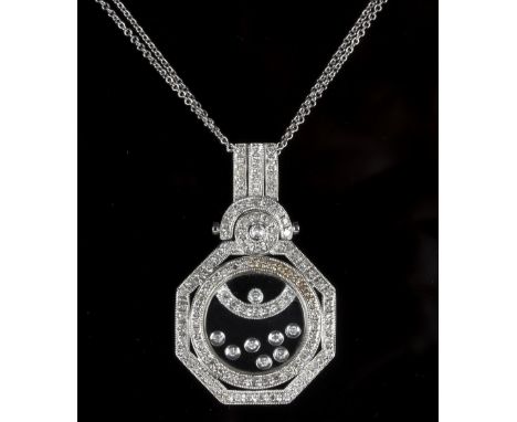 A diamond pendant, in the manner of Chopard 'Happy', the octagonal Art Deco style mount with clear centre encasing a number o