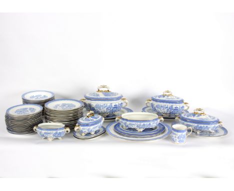 A Royal Worcester blue and white willow pattern dinner service, sixty-three pieces Condition Report: Soup tureen has broken a