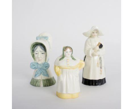 Three Royal Worcester candle snuffers, an Old Woman, 8.5cm high, a French Cook, 6.5cm high and a Nun, 9cm high