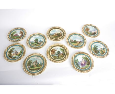 Ten Brown Westhead Moore &amp; Co. plates, hand painted castles and follies, some signed AG, within moulded, gilt and turquoi