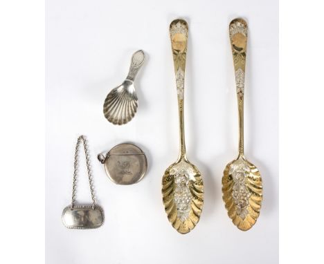 A George III silver caddy spoon, Elizabeth Morley, London 1797, with bright cut handle and shell bowl, two silver gilt berry 