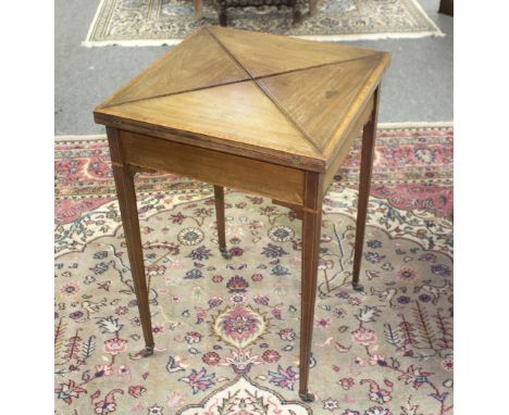 An Edwardian mahogany envelope card table fitted a drawer, on square taper legs, 49.5cm wide Condition Report: The table top 