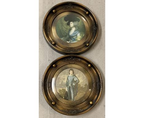 2 vintage circular framed portrait prints in heavy bronzed effect wooden frames. Each approx. 35cm diameter. 