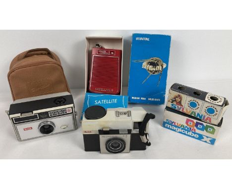 2 vintage Kodak cameras together with a boxed Solid State Satellite transistor radio. Model 010, in excellent condition, with