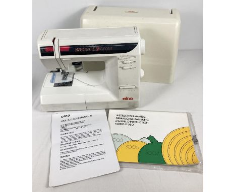 An Elna 3007 Swiss design electric sewing machine, complete with instruction manual. Together with a modern Hobby Gift oil cl