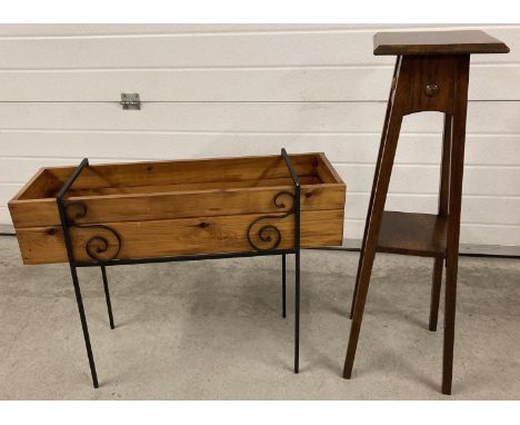 2 vintage wooden plant stands. A wooden trough style planter in black wrought iron stand with scroll detail together with an 