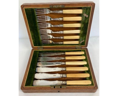 A vintage silver plated set of fish knives &amp; forks in a period wooden case, set with brass cartouche to lid. 