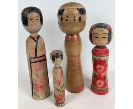 4 vintage wooden red &amp; black hand painted Japanese Kokeshi dolls. Two signed to underside. Tallest approx. 31cm tall, sma