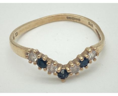 A 9ct gold and Cubic zirconia set wishbone half eternity ring. Fully hallmarked inside band and stamped CZ. Ring size R. 