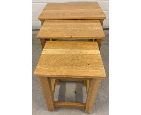 A modern solid light oak nest of 3 tables with square legs, by Koala Furnishings Ltd. 