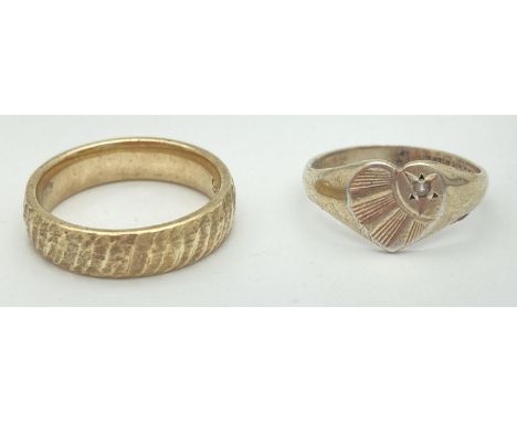 2 vintage gold on silver rings. A 22ct gold on silver heart shaped signet ring set with clear stone (ring size K) together wi