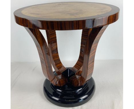 An Art Deco design circular shaped occasional/lamp table. With multi-coloured wood veneer and high gloss finish. Approx. 59cm