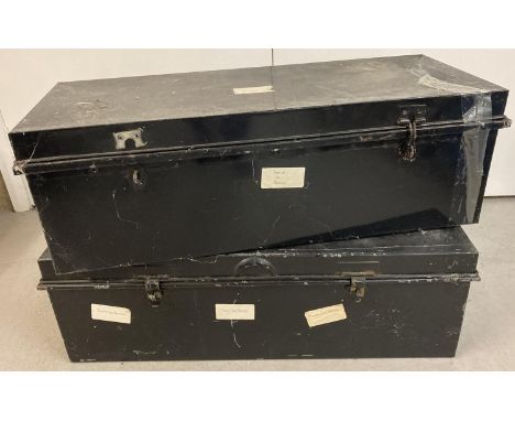 2 vintage metal long 2 handled trunks, painted black, with hook over clasps. 1 clasp missing from 1 trunk. Each approx. 27cm 