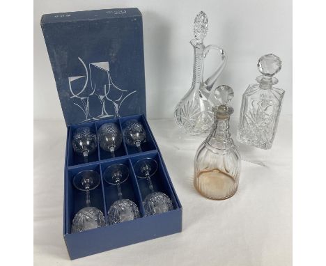 3 modern and vintage clear cut glass decanters with stoppers. Together with a boxed set of 6 Bohemia Crystal stemmed wine gla